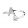 Product Afbeelding Vooraanzicht van onze letter collectie. Deze prachtige ring met de letter A. De A is helemaal ingelegd met zirkonia's. De ring A is verstelbaar en zo kan iedereen hem dragen. Aan het uiteinde zit een grote zirkonia. Een echt eyecatcher aan je vinger. Of je nou van iemand houd met een A of dat je een A bent. Gemaakt van 925 sterling zilver. Ook zo trots op je intialen.